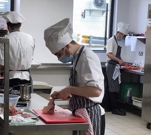 Conor Burns working in SERC kitchen for Head Chef Takeover